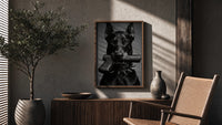 Doberman Pistol Spiked Collar poster framed above a fluted sideboard beside a potted tree