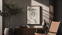 mother embracing seated daughter vintage art print poster framed above a fluted sideboard beside an olive tree