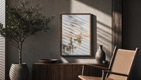 woman and dog on a dock watching sailboats vintage art print poster framed above a fluted sideboard beside an olive tree