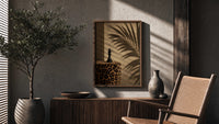 Leopard Print Chess King poster framed above a fluted sideboard beside a potted tree
