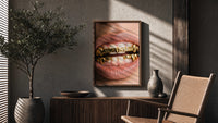 AMG Grillz Gold Grill poster framed above a fluted sideboard beside a potted tree
