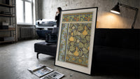 Art Nouveau botanical pattern with gourds and flowers vintage art print print in a slim black frame leaning on a dark…