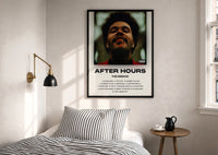 The Weeknd After Hours Album Cover print in a black frame above a bed with striped linens
