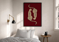 Mirrored Cheetahs print in a black frame above a bed with striped linens, a brass wall lamp and a sunlit window