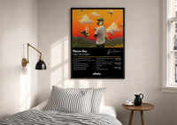 Tyler the Creator Flower Boy Tracklist print in a black frame above a bed with striped linens