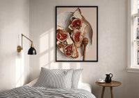 Figs, Cheese and Walnuts print in a black frame above a bed with striped linens, a brass wall lamp and a sunlit window