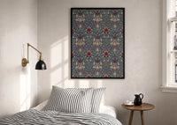 William Morris Snakeshead print in a black frame above a bed with striped linens, a brass wall lamp and a sunlit window