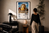 Travis Scott Astroworld Album Cover print in a black frame on a sunlit wall with a viewer