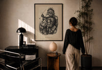 Thomas Nast Merry Old Santa Claus print in a black frame on a sunlit plaster wall, a woman looking on beside a mushroom lamp