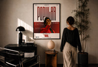 The Weeknd Popular Idol Magazine Cover print in a black frame on a sunlit wall with a viewer