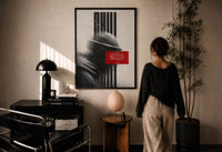 Hypebeast Motivational Portrait Glitch print in a black frame on a sunlit wall with a viewer