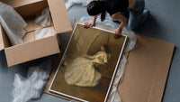 seated woman in white dress vintage art print framed print being unpacked from protective bubble wrap and a box