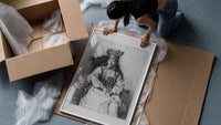 crowned queen seated portrait vintage art print framed print being unpacked from protective bubble wrap and a box