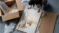 woman and dog on a dock watching sailboats vintage art print framed print being unpacked from protective bubble wrap and…