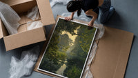 forest pond framed by overhanging branches vintage art print framed print being unpacked from protective bubble wrap and…