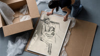 mother embracing seated daughter vintage art print framed print being unpacked from protective bubble wrap and a box