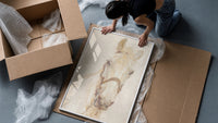 white horse head portrait with bridle vintage art print framed print being unpacked from protective bubble wrap and a box