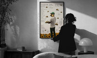 Tyler, the Creator Flower Boy Album Cover print in a slim black frame being hung on a sunlit wall in a monochrome room
