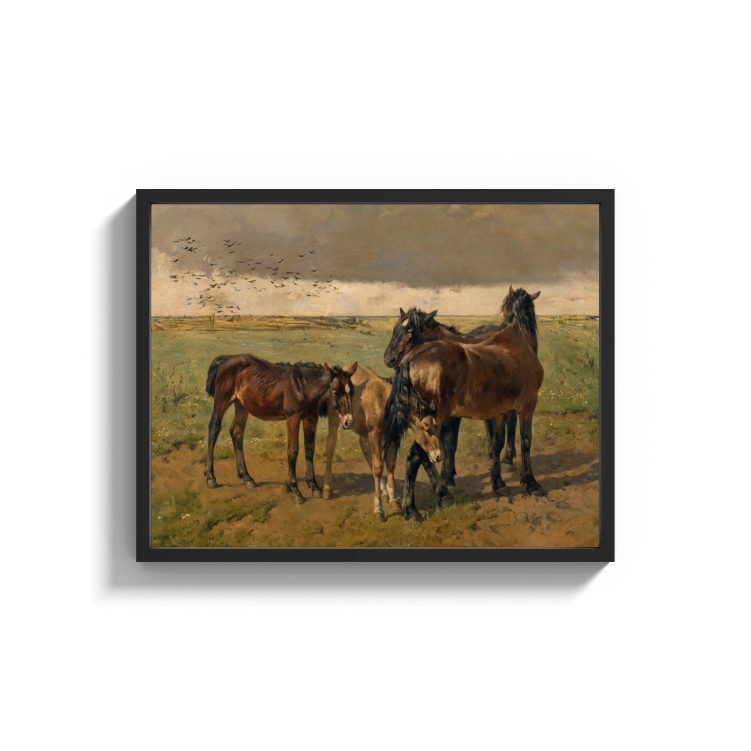 Framed Group of horses in field print shown as a wide statement piece on a clean white wall