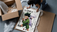 Gon and Killua anime characters framed print being unpacked from protective bubble wrap and a box