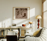 soldiers singing around a piano print in an oak frame above a mid-century book console with a vintage radio