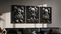 KAWS LV Monochrome Art Print Set of 3 in black frames on a grey wall above a leather sofa