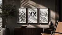 KAWS XX Outline Sketch Wall Art Set of 3 in walnut frames above a sideboard in a warm room