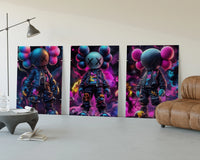 KAWS Neon Battle Figures Set of 3 displayed beside a brown leather sofa