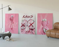 Bubblegum Pink KAWS XX Hypebeast Wall Art Set of 3 displayed beside a brown leather sofa
