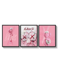 Bubblegum Pink KAWS XX Hypebeast Wall Art Set of 3 arranged on a bright gallery wall
