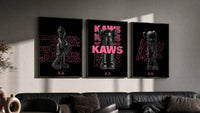Neon Pink Noir KAWS Hypebeast XX Wall Art Set of 3 in black frames on a grey wall above a leather sofa