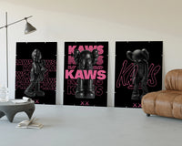 Neon Pink Noir KAWS Hypebeast XX Wall Art Set of 3 displayed beside a brown leather sofa