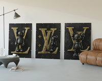 KAWS LV Feat. XX Hypebeast Wall Art Set of 3 displayed beside a brown leather sofa