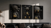 KAWS Black Label XX Hypebeast Wall Art Set of 3 in black frames on a grey wall above a leather sofa