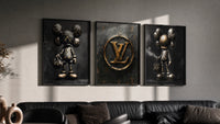 KAWS LV Gold Vault Poster Set of 3 in black frames on a grey wall above a leather sofa