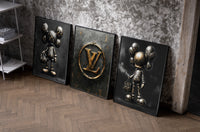 KAWS LV Gold Vault Poster Set of 3 as black-framed prints leaning against a raw-plaster wall