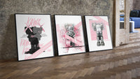 Pink KAWS Companion Triptych leaning on parquet beside a vintage loft door