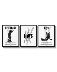 KAWS Black & White Classics triptych arranged on a bright gallery wall