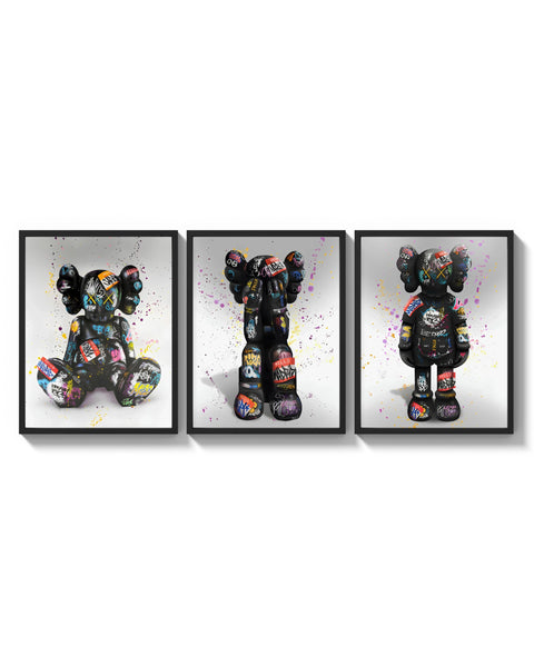 KAWS Companion Graffiti Triptych arranged on a bright gallery wall