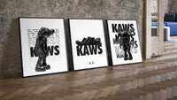 KAWS Legacy Archive three-piece set leaning on parquet beside a vintage loft door