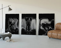 KAWS Neon Companions Triptych displayed beside a brown leather sofa