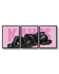 KAWS Pink Reclining Companion Set of 3 arranged on a bright gallery wall