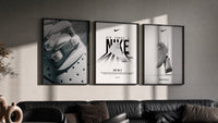 Nike AF1 White Triptych in black frames on a grey wall above a leather sofa