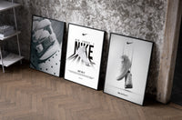 Nike AF1 White Triptych as black-framed prints leaning against a raw-plaster wall