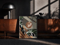 Black-framed Iced Coffee Flat Lay print on the floor in front of a dark wooden console