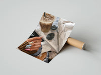 Gently curled Iced Coffee with Sunglasses and Handbag print beside its protective shipping tube