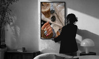 Iced Coffee with Sunglasses and Handbag print in a slim black frame being hung on a sunlit wall in a monochrome room