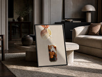 Iced Latte Cream Pour print on the floor, leaning against a travertine table
