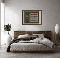 Art Nouveau women with roses print in a dark wood frame above a rattan bed on a plaster wall
