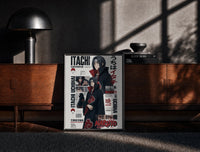 Black-framed Itachi Uchiha anime character print on a moody console with designer coffee-table books